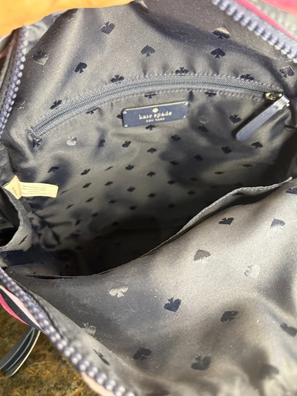 kate spade Navy & Pink Striped Mini Backpack with Lip Motif